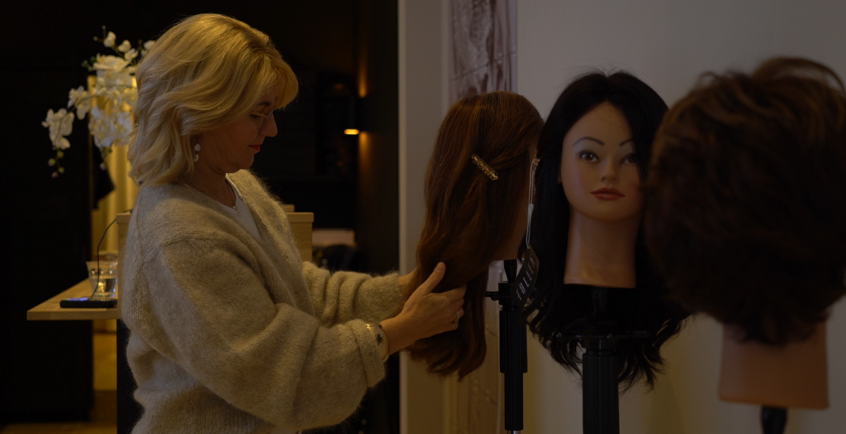 Hilde Kloosterman working on wigs